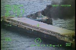 The tugboat Thomas Dann burns after a fire broke out Friday 8 miles east of Matanzas. A good Samaritan recovered the six crewmembers from a life raft. U.S. Coast Guard photo courtesy Air Station Clearwater.