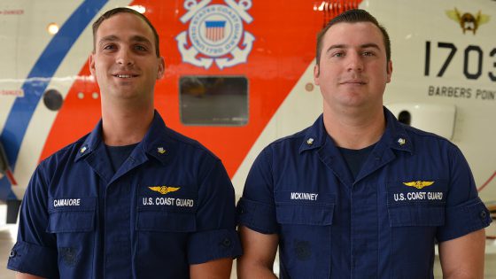 U.S. Coast Guard Petty Officers 3rd Class Kyle Camaiore and Jonathan McKinney, both aviation maintenance technicians stationed at Air Station Barbers Point, Hawaii, pose in front an HC-130 Hercules airplane Sept. 27, 2016. Camaiore and McKinney were awarded the Coast Guard Achievement Medal for their heroic actions performed while attending flight engineer school in Tampa, Florida. (U.S. Coast Guard photo by Petty Officer 2nd Class Melissa E. McKenzie)